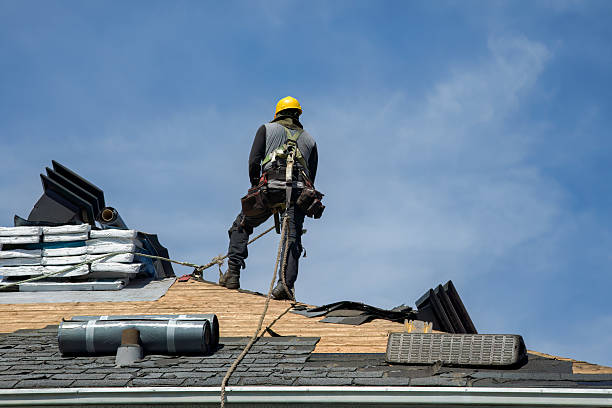 Professional Roofing technician working in Parsons, KS